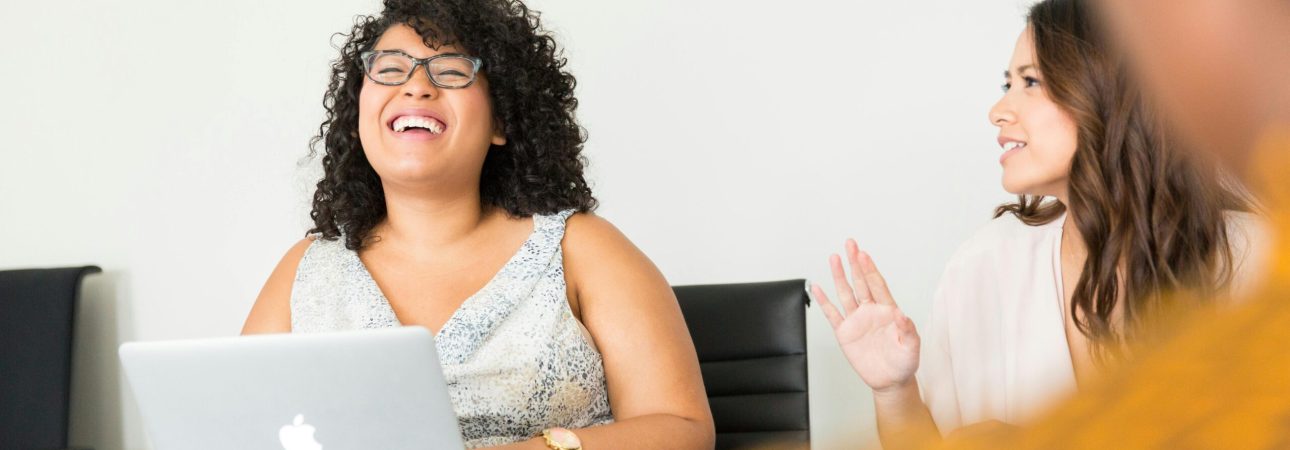 Office team meeting laughing